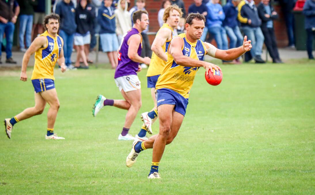 Former AFL star Steven Motlop kicks on his way to 50 disposals on debut for North Warrnambool Eagles against Port Fairy. Picture by Justine McCullagh-Beasy