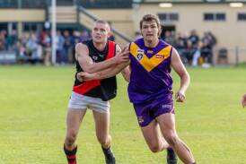 Cobden ruck recruit Tim Auckland, pictured opposed to Port Fairy's Jake Bartlett, has produced a blistering start to his Hampden league career. Picture by Eddie Guerrero