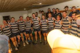Allansford players belt out the song after a drought-breaking win against Merrivale. Picture by Eddie Guerrero