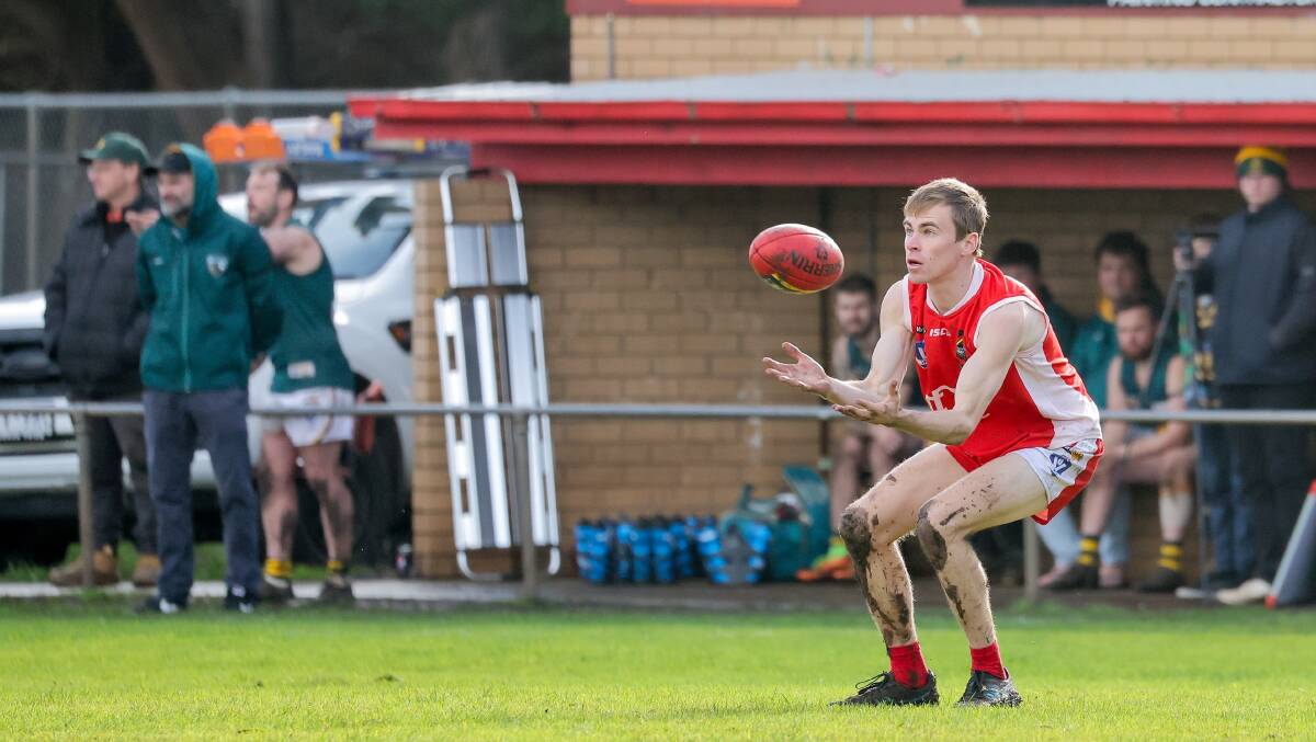 Dennington's Jeremy Turner, pictured last season against Old Collegians, will make his return this weekend. Picture by Anthony Brady
