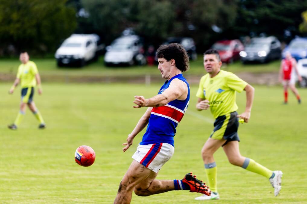 Brad Gedye kicks the ball forward for Panmure last year. Picture by Anthony Brady
