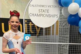 Warrnambool's Anna Robson is all smiles after winning her state title in Melbourne. Picture supplied