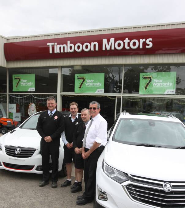 Longevity: Timboon Motors' dealer principal Barry Cook, right, with his sales team of Brett Harty, left, David Costin and Ray Gillingham. 