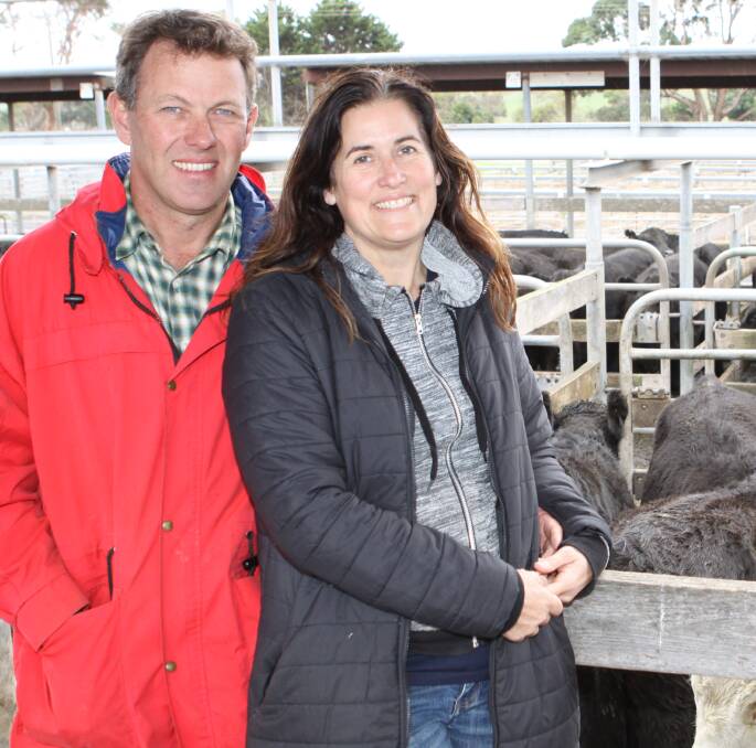 Smiling: Jason and Leonie Campbell of Portland were among the happy vendors at the Warrnambool April store sale. They gained up to 317c/kg for 12 month old Angus steers. 