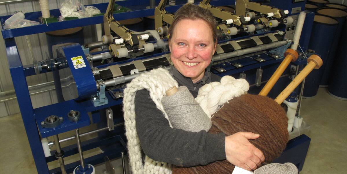 Spinning: Isabel Renters with some of the alpaca wool spun at the Great Ocean Road Woollen Mill that she and her husband have set up at Ecklin South. Picture: Everard Himmelreich