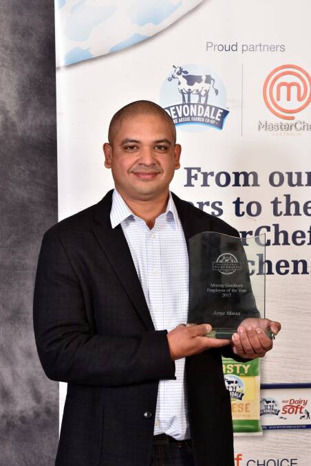 Recognition: Jorge Massa with the Employee of the Year award he received at this year's Great South West Dairy Awards. Mr Massa manages a Cooriemungle dairy farm for the Leslie Manor Trust Dairy Farms.  