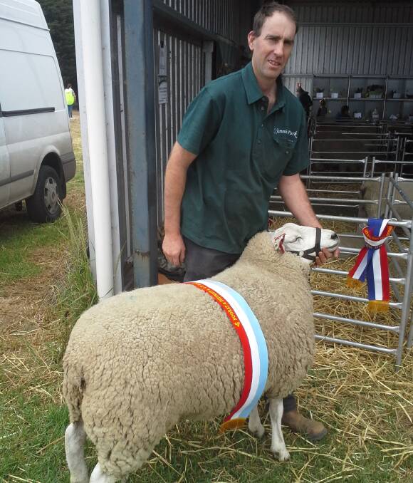 Chris Parker, of Summit Park, with his Texel ewe that was Supreme Champion Ewe at this year's Noorat show. The Noorat show was one of three regional shows at which Summit Park was successful this year.