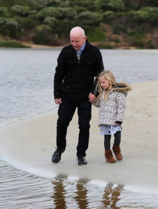 Water safety: Warrnambool council candidate David MacPhail with his granddaughter Ava Toleman-Conn at the Merri River. Picture: Rob Gunstone 