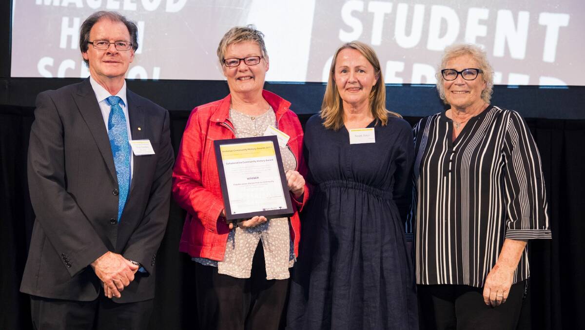 Chuffed: Julie Eagles, second from left, and Susan Jones from the Fletcher Jones: website project with the Victorian historical society's Don Garden and Judy Maddigan, right, from the Public Records Office.