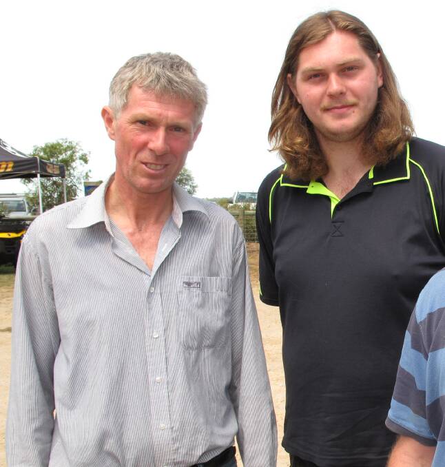 Glass half full: Cavendish sheep producer John Huf and his son Nicholas expect to be carting water this summer but count themselves lucky compared to farmers further north.