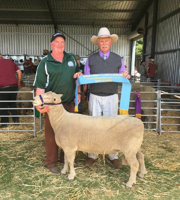 Supreme: Peter McDonald, left, of the Grassbank Southdown stud at Grassmere with the Noorat show's Supreme Sheep of the Show and judge Gavin Wall.