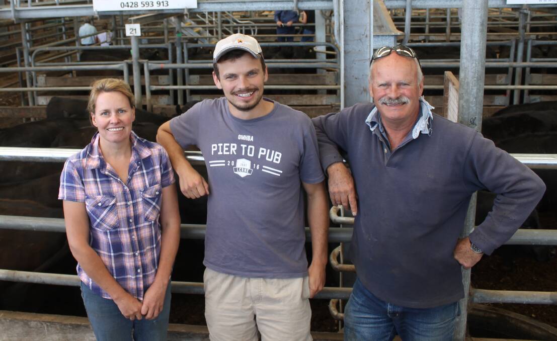 Farm manager Sarah Tate with Jack and Andrew Steel, Penrith Nominees, Winchelsea, with their top pen of 19 Angus heifers, 341kg, Te Mania blood, that made $1320.