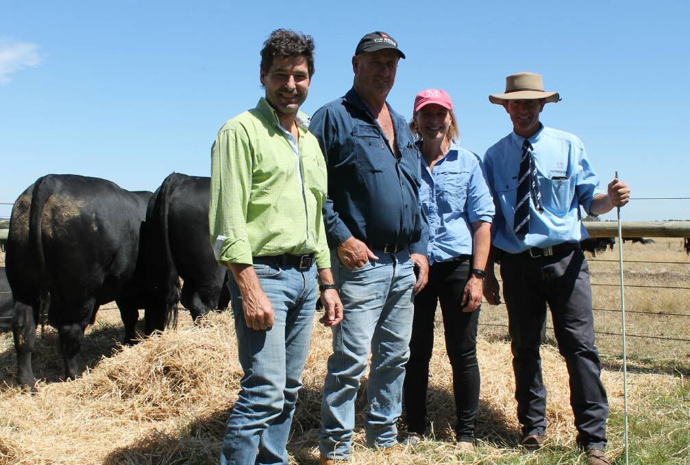 Peter Robertson and Ken Davis of Condah Hills with Pathfinder's Nick and Sara Moyle and the equal $16,000 top-priced bull, Lot 9.