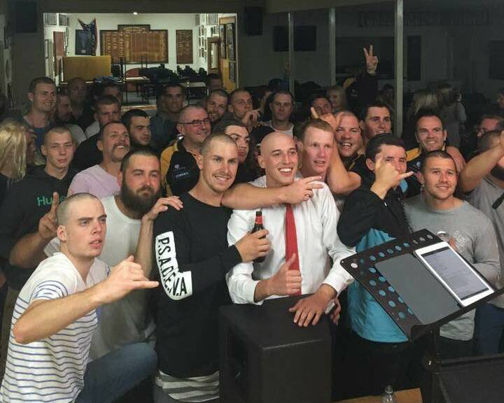 HAPPY TO HELP: A group of North Warrnambool Eagles players show off their newly-shaved heads, after a club function in support of fellow footballer Tim O'Brien, who is battling cancer. 