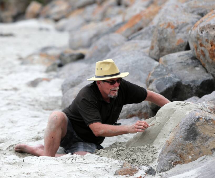 Covert: Mystery sand sculptor Richard, from Ballarat, has been creating works of art along Port Fairy's beaches, delighting beachgoers. Richard has been visiting Port Fairy for about 20 years. Picture: Rob Gunstone