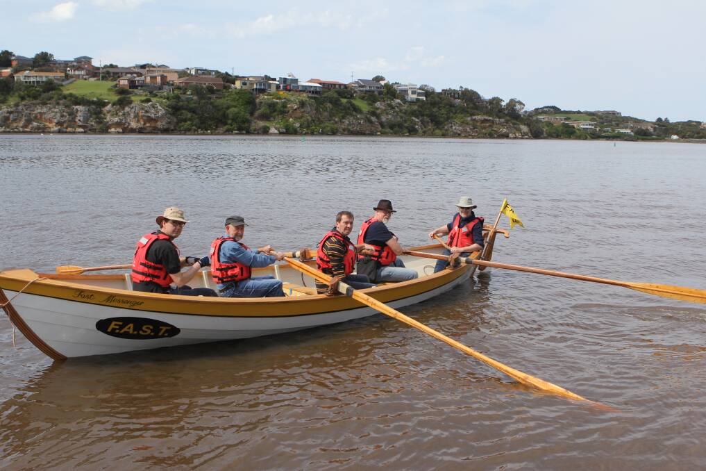 GO: Tristan Forster, Pat Shanahan, Noel Middleton, Pat Groot and Alan Northey in FAST Messenger on the Hopkins River. The Victorian St Ayles Skiff Championships or the Australian Whale Boat Racing Championships is on February 24 and 25.