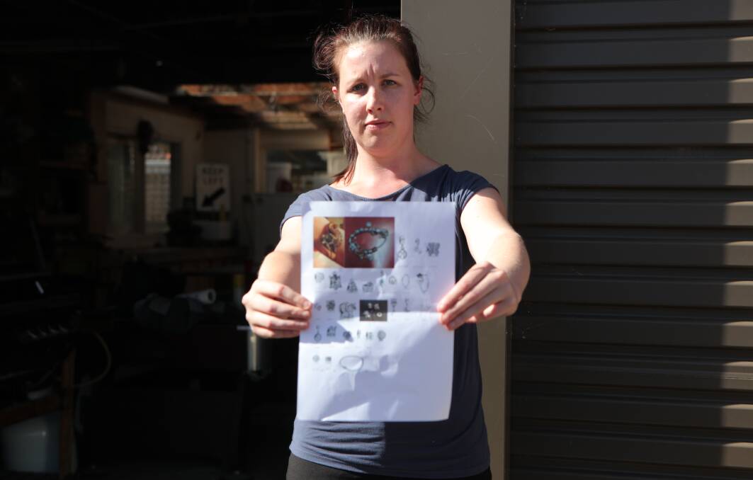 UNHAPPY: Shanae Hyder holds a piece of paper with the jewellery items stolen from her garage on Saturday. The jewellery was worth more than $9000. 