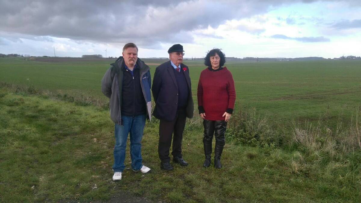 NOT GIVING UP: Maria and Max Cameron at the Bullecourt battlefields site with Portland man Rick Rowbottom. 