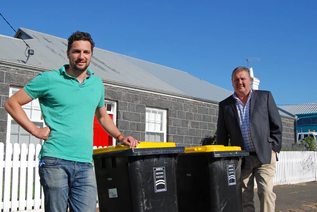 EXTRA SERVICE: Moyne Shire mayor Mick Wolfe the council's waste management officer Sam Rudolph.