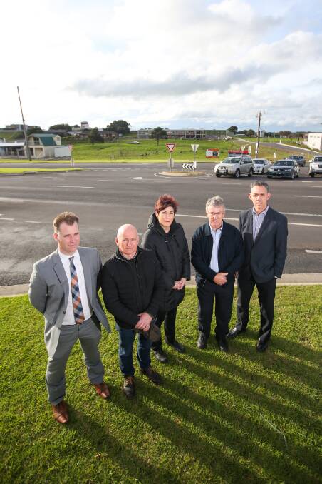 REPORT: Warrnambool City Council infrastructure director Scott Cavanagh with Peter Hulin, Sue Cassidy, Rob Anderson and Mike Neoh at the Botanic Road intersection.