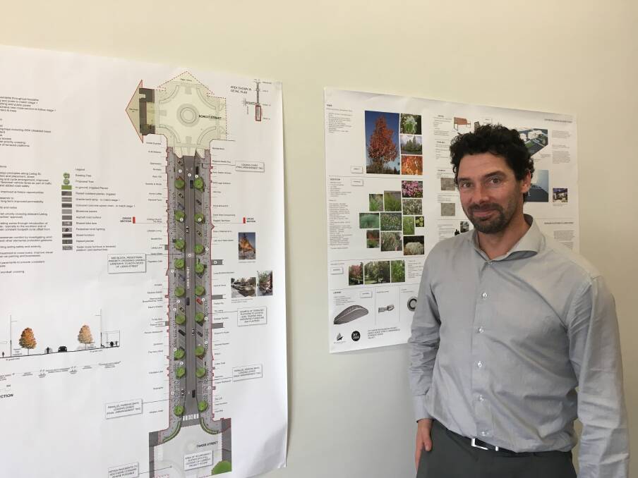 Warrnambool City Council city centre renewal project manager Ben Storey with the plans on display for public comment at the Liebig Street project office.  