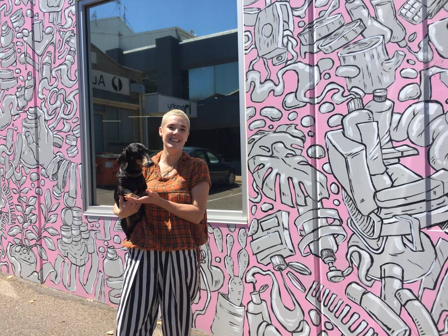 Biba Warrnambool and Grizzly Adams owner Mia Nicolson outside her salon with her dog Tex. 