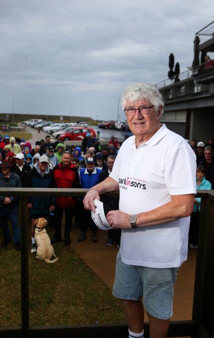 DEDICATED: Organiser Andrew Suggett and supporters of Parkinson's Victoria braved the wild weather to walk along Warrnambool's promenade. Picture: Amy Paton