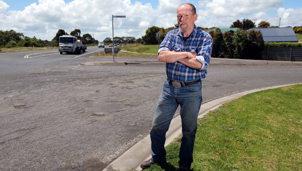 UNSAFE: Allansford resident Peter Carter is unhappy with the condition of the Garabaldi Lane and Princes Highway intersection. Picture: Rob Gunstone