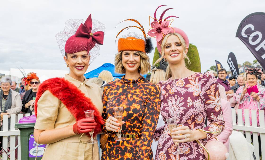 Sisters Bronwyn Lynch, Shandell Wishart and Courtney Logue at last year's May Racing Carnival. Picture by Anthony Brady