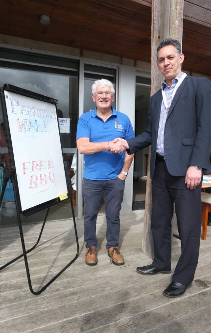 Walk for a cause: Warrnambool Parkinson's Support Group co-ordinator Andrew Suggett with mayor Michael Neoh at Sunday's walk. Picture: Amy Paton