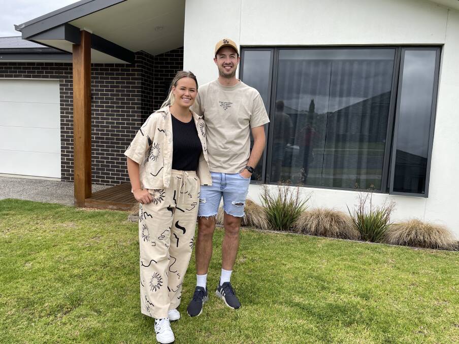Shaylne and Jeremy Hausler outside 18 Quarry Road, Warrnambool, which sold for $880,000. 