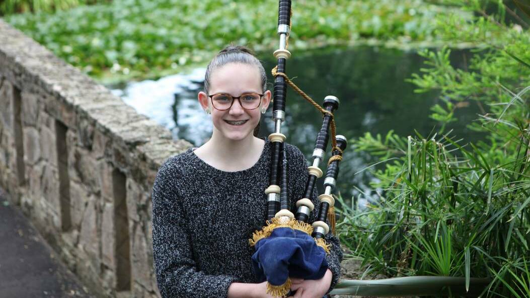 Healing power: Playing the bagpipes has had a healing effect on Stacey Riches' lung condition. She has been practising with Warrnambool's pipes and drums band in the botanic gardens to prepare for Saturday's competition.
