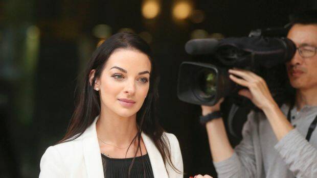 Channel Seven reporter Laura Banks leaves the Downing Centre Local Court in Sydney on Monday. Photo: AAP