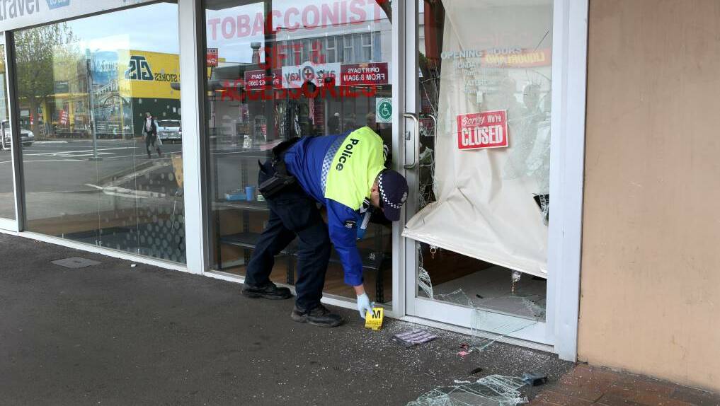 Police working at the scene of a break-in on Lava Street. Picture: Amy Paton