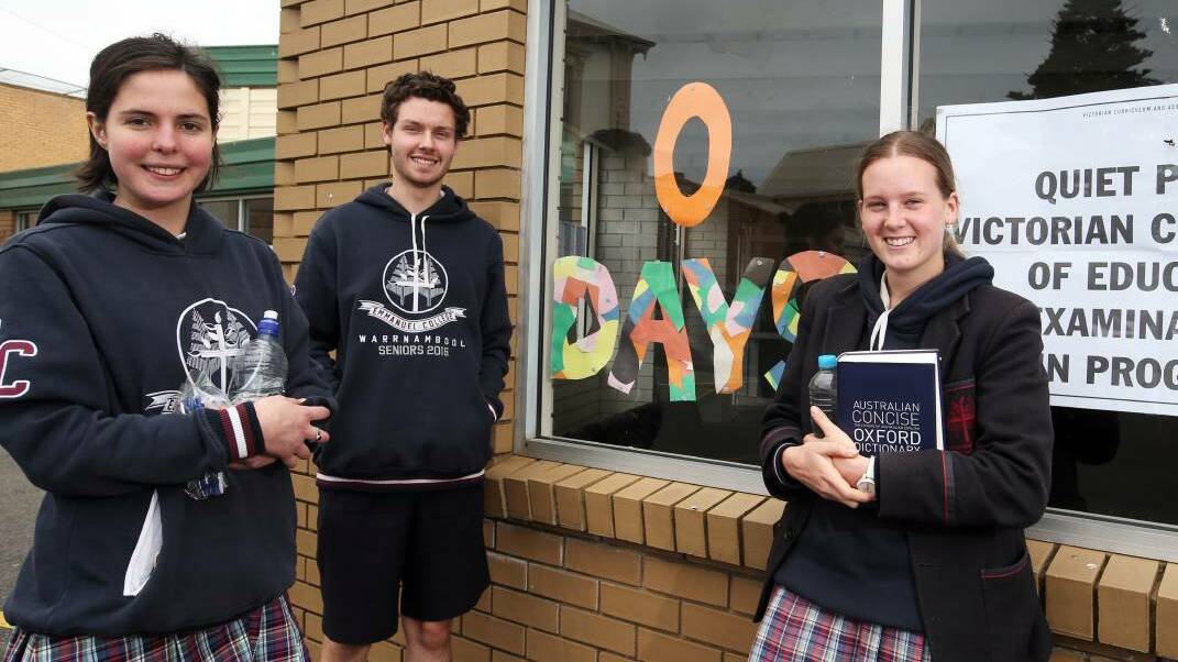 On again: Emmanuel College students Phoebe grant, Jacob Lewis, and Nicola McKenzie, all 18, after completing their VCE English exam. Picture: Rob Gunstone