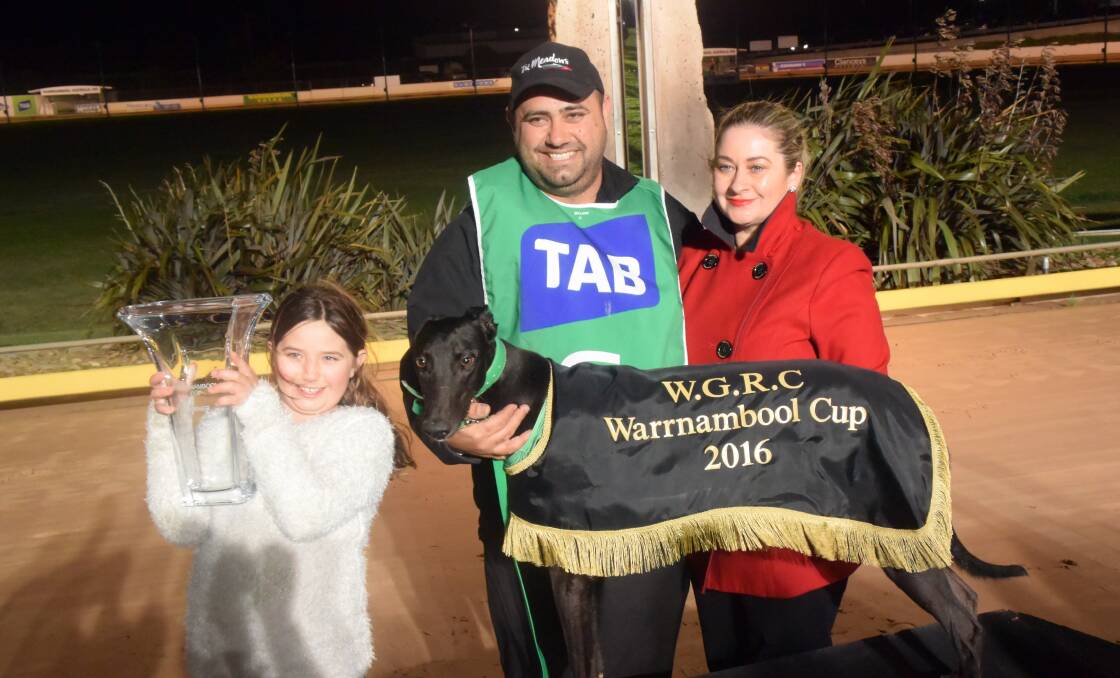 Trainer Anthony Azzopardi, daughter Kayla and GRV board member Peita Elkhorne with Zambora Brockie after the Warrnambool Cup win.