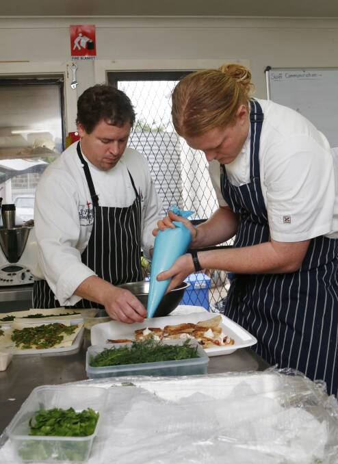 Gladioli head chef Matt Dempsey lends a helping hand to Michael Clancy.