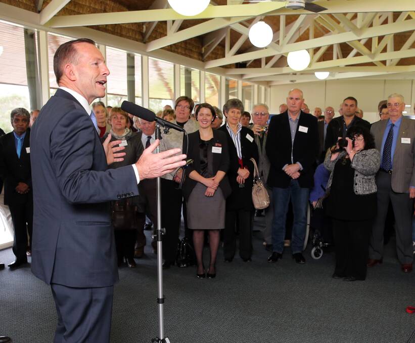 TRIBUTE: Prime Minister Tony Abbott on Friday praised the work of community volunteers, as he addressed a gathering at the Hamilton Golf Club during his short tour of south-west Victoria. Picture: Rob Gunstone