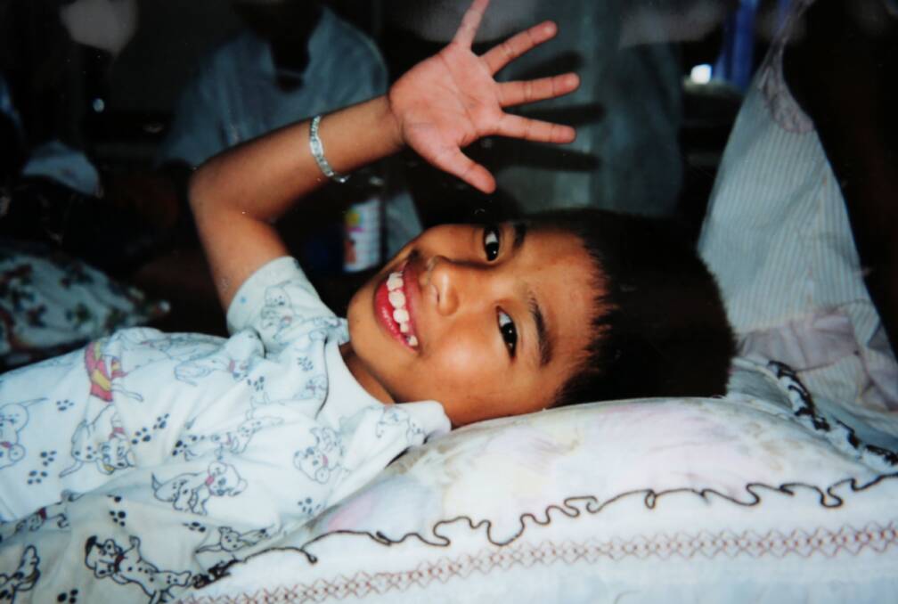 A young boy with Cerebral Palsy who is supported by the Cambodia Trust.
