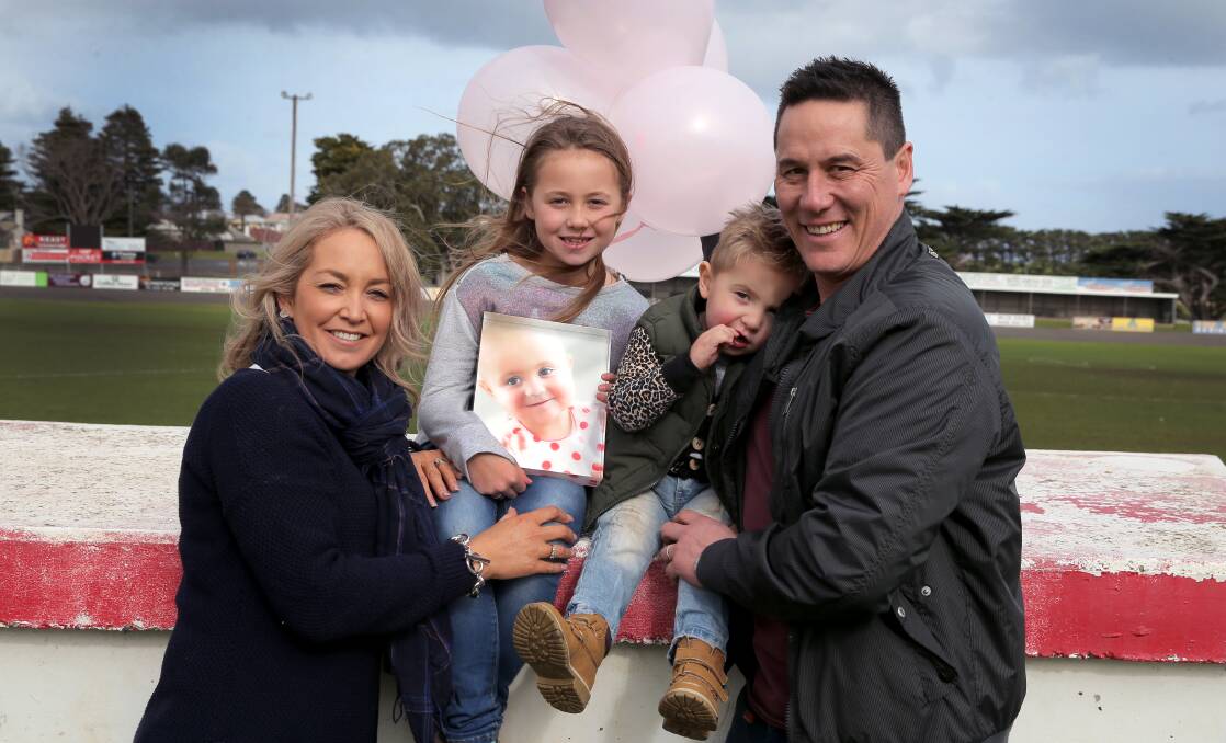 Warrnambool's Tracy and Andrew Chow, pictured with children Bella, 8, and Lawson, 3, established the Leila Rose Foundation in honour of their daughter, who died of a rare cancer. Picture: Rob Gunstone