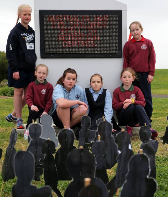 FREEDOM: St Pius X and St John's primary's Olivia Wollermann, 11, Brigid Ewing, 9, Tasmyn Curran, 11, Libby Gass, 11, Matilda Sewell, 9, and Sophie Sully, 10, are among the pupils standing up for refugee children. Picture: Rob Gunstone