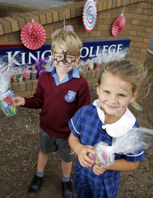 FUN TIMES AHEAD: King's College prep students Zac Greene, 6, and Lottie McCosh, 6, are excited for the school's community fair on Saturday. Picture: Rob Gunstone