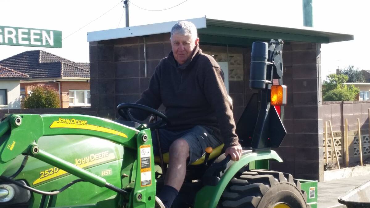 HELPER: Greg Ritchie volunteers his time to help maintain the City Memorial Bowls Club greens.