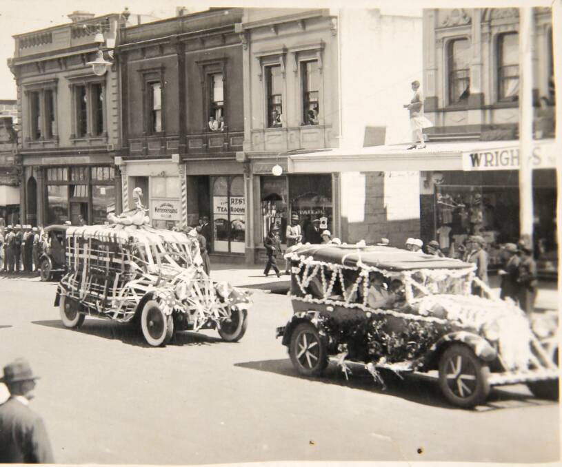 EARLY CELEBRATION: The image above displays cars in full decoration in celebration of The Procession. The picture was dated August 16, 1928. 
