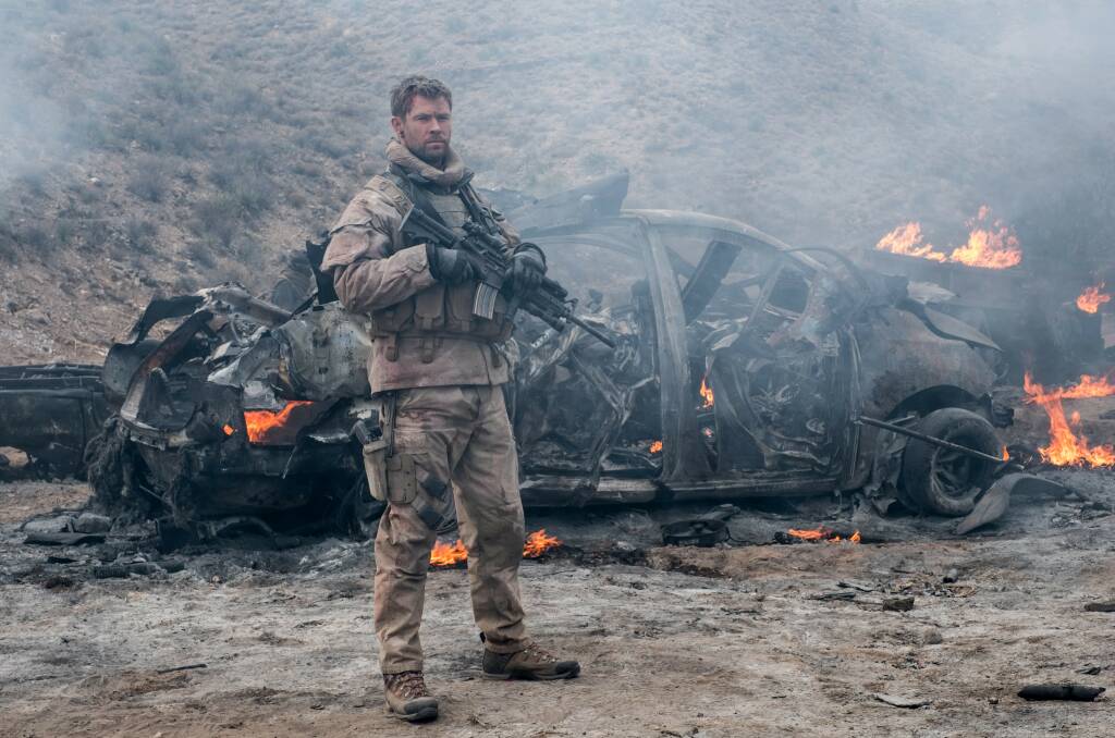 Leading the way: Chris Hemsworth stars as Captain Mitch Nelson in Afghanistan-set real-life war drama 12 Strong, which is rated MA15+ and in cinemas now.