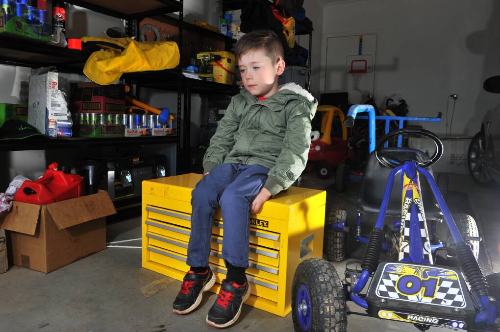 SAD DAY: Heartless thieves have robbed Connor Jones, 6, of his cherished go-kart. Picture: NONI HYETT