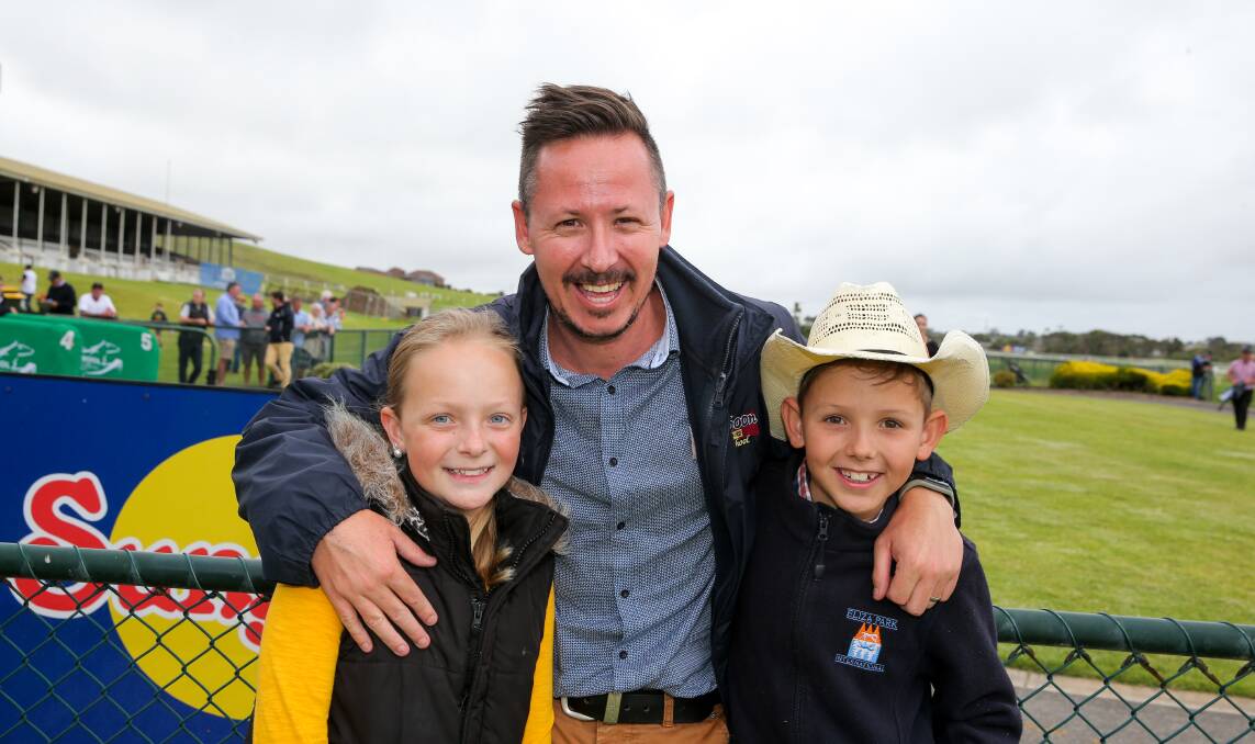 Family Fun: Matisse Fitzpatrick, 11, dad Sean Fitzpatrick, and Seamus Fitzpatrick, 10, made the trip from Timboon for the twilight races after school finished for the day. Pictures: Rob Gunstone