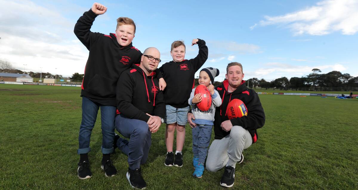 Family-minded: East Warrnambool coaches Danny Chatfield (left) and Sam Grinter, with their kids Jyah, 10, and Kobi Chatfield, 8, and Chayce Grinter, 5. Picture: Rob Gunstone