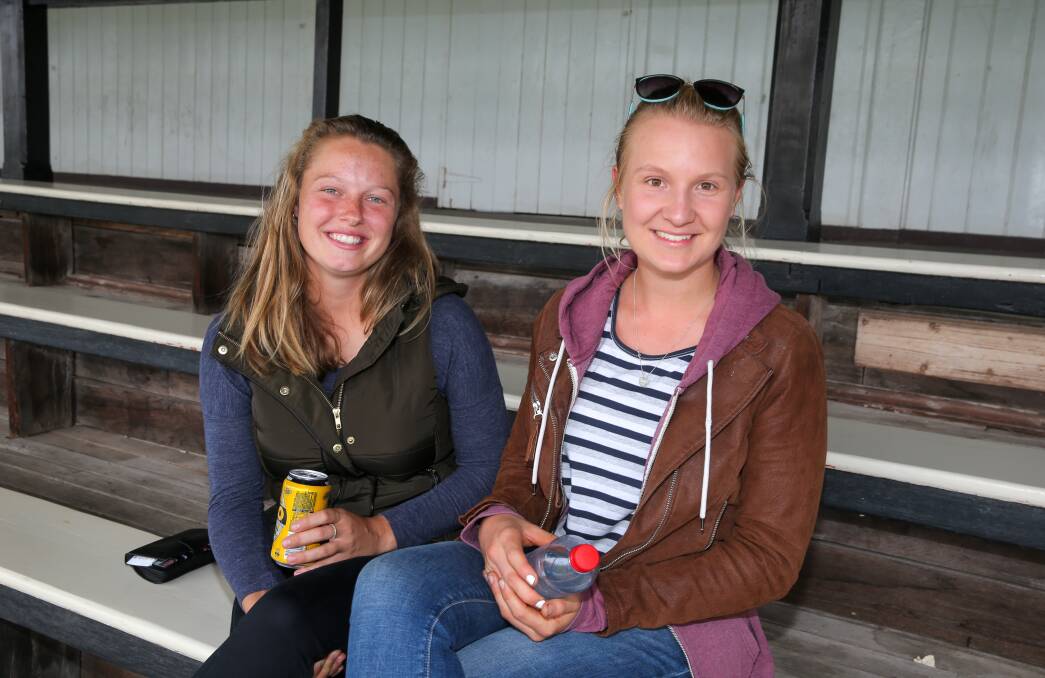 Ellen Oliver and Ceri Young, both of Warrnambool, enjoyed a relaxed night watching the horses in action.