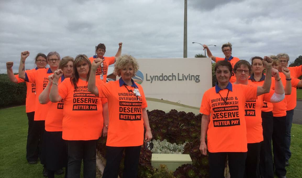 Overworked and underpaid: Lyndoch Living health workers wear orange on the job in a bid for better pay. Picture: Supplied